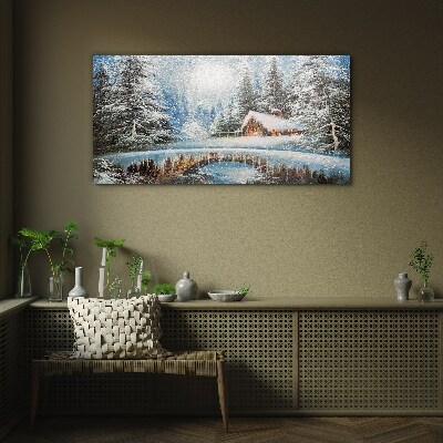 Tableau imprimé sur verre Paysage d'hiver avec un chalet dans la forêt