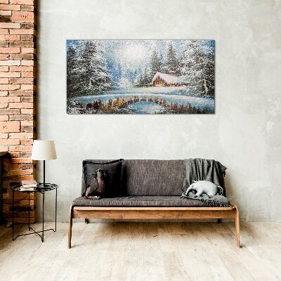 Tableau imprimé sur verre Paysage d'hiver avec un chalet dans la forêt