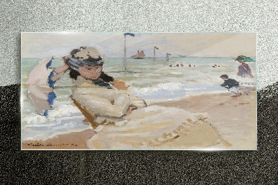 Tableau photo sur verre Femme sur la plage avec un parasol