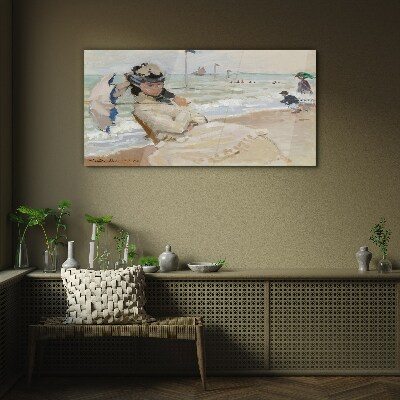 Tableau photo sur verre Femme sur la plage avec un parasol
