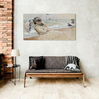 Tableau photo sur verre Femme sur la plage avec un parasol