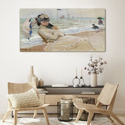 Tableau photo sur verre Femme sur la plage avec un parasol