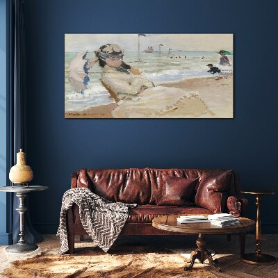 Tableau photo sur verre Femme sur la plage avec un parasol