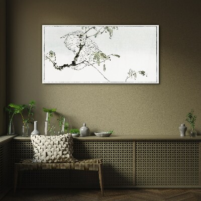 Tableau photo sur verre Un oiseau sur une branche