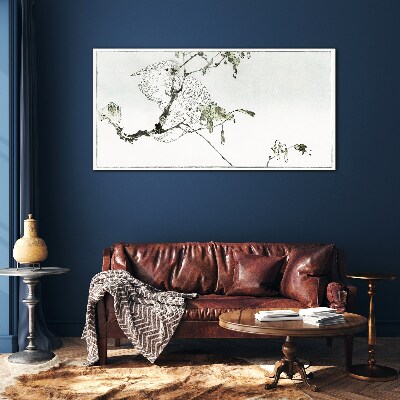 Tableau photo sur verre Un oiseau sur une branche