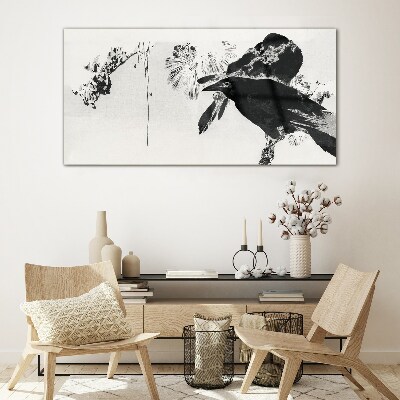 Tableau verre imprimé Un oiseau noir sur fond de nature