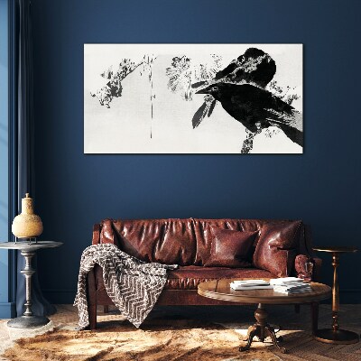 Tableau verre imprimé Un oiseau noir sur fond de nature