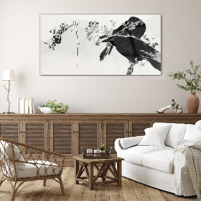 Tableau verre imprimé Un oiseau noir sur fond de nature