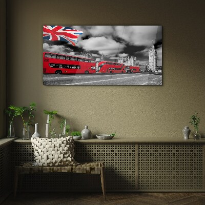 Tableau sur verre Bus londoniens rouges avec le drapeau britannique