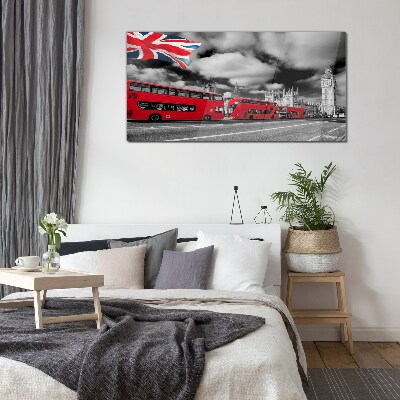 Tableau sur verre Bus londoniens rouges avec le drapeau britannique