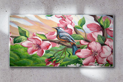 Tableau sur verre Un oiseau sur fond de fleurs printanières