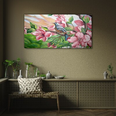 Tableau sur verre Un oiseau sur fond de fleurs printanières