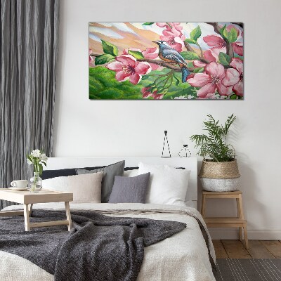 Tableau sur verre Un oiseau sur fond de fleurs printanières