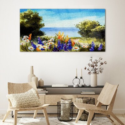 Tableau imprimé sur verre Paysage avec des fleurs au bord de la mer