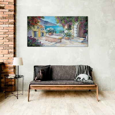 Tableau en verre Une ville balnéaire fleurie