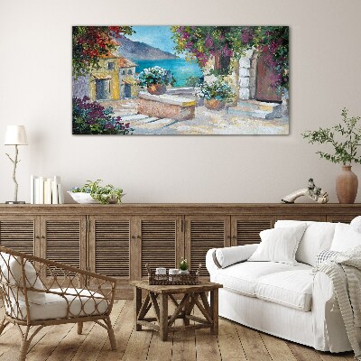 Tableau en verre Une ville balnéaire fleurie