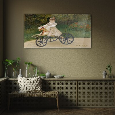 Tableau photo sur verre Enfant sur un porteur