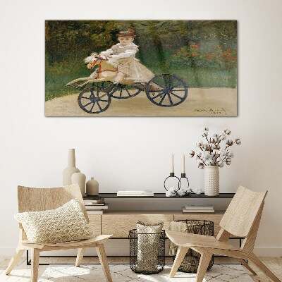 Tableau photo sur verre Enfant sur un porteur