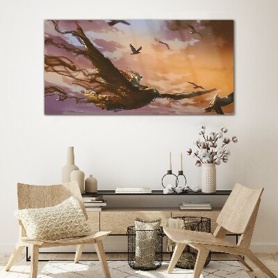 Tableau verre imprimé Vol d'oiseaux au soleil couchant