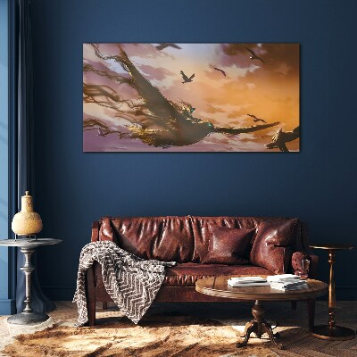 Tableau verre imprimé Vol d'oiseaux au soleil couchant