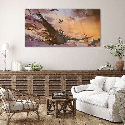 Tableau verre imprimé Vol d'oiseaux au soleil couchant