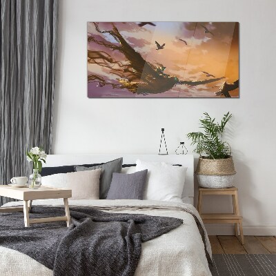 Tableau verre imprimé Vol d'oiseaux au soleil couchant