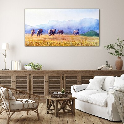 Tableau verre imprimé Un grand troupeau de chevaux dans le pré