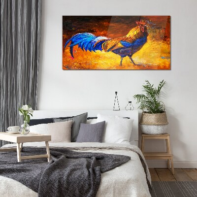 Tableau verre imprimé Un coq coloré sur fond de feu