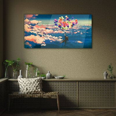 Tableau imprimé sur verre Vol dans les nuages avec des ballons