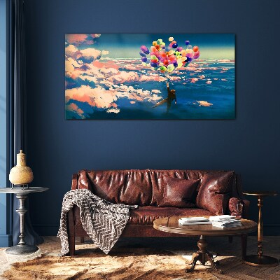 Tableau imprimé sur verre Vol dans les nuages avec des ballons
