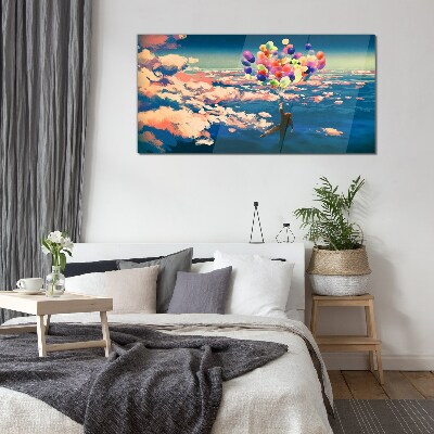 Tableau imprimé sur verre Vol dans les nuages avec des ballons