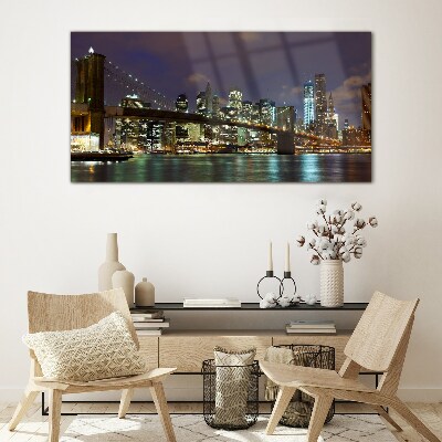 Tableau photo sur verre Le pont de Brooklyn dans la lueur nocturne