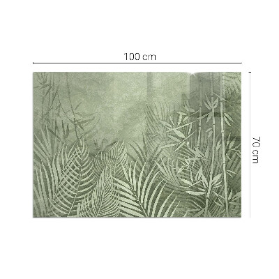 Plaque de sol en verre pour poêle Arrière-plan avec des feuilles tropicales