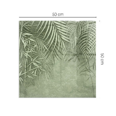 Plaque de sol en verre pour poêle Arrière-plan avec des feuilles tropicales
