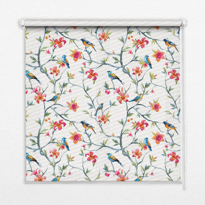 Store enrouleur Un oiseau sur une branche