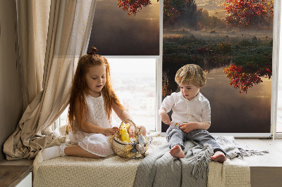 Store intérieur Coucher de soleil derrière les arbres