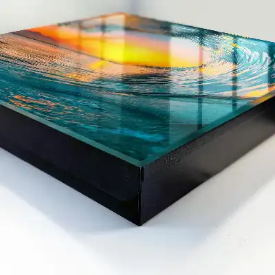 Tableau représentant un coucher de soleil sur la mer