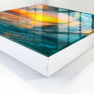 Tableau représentant un coucher de soleil sur la mer