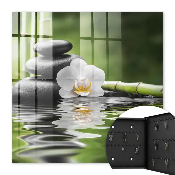 Pierres zen et orchidées dans l'eau