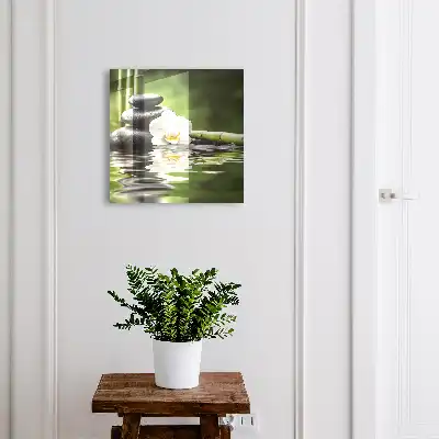 Pierres zen et orchidées dans l'eau