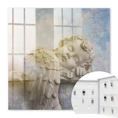 Statuette d'un ange endormi aux couleurs chaudes