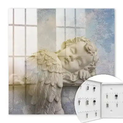 Statuette d'un ange endormi aux couleurs chaudes
