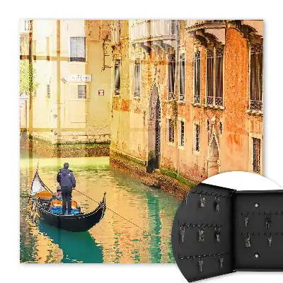 Tableau d'un canal vénitien avec des bâtiments en arrière-plan