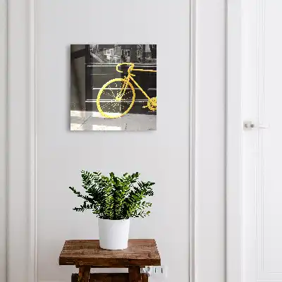 Vélo jaune sur fond noir et blanc