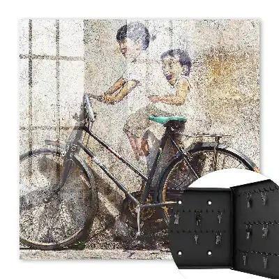Tableau Des enfants et un vélo sur un vieux mur