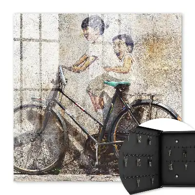 Tableau Des enfants et un vélo sur un vieux mur