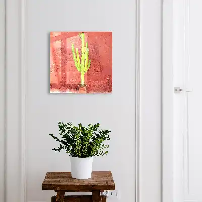 Cactus vert sur un mur rouge