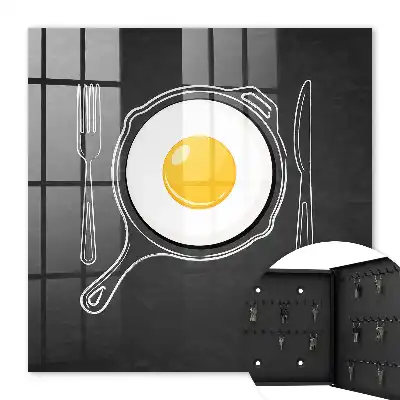 Œuf au plat sur fond noir