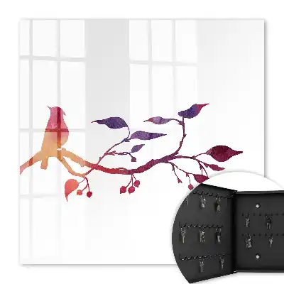 Une branche avec un oiseau aux couleurs rouges et violettes