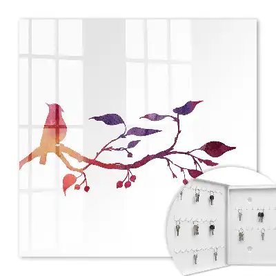 Une branche avec un oiseau aux couleurs rouges et violettes